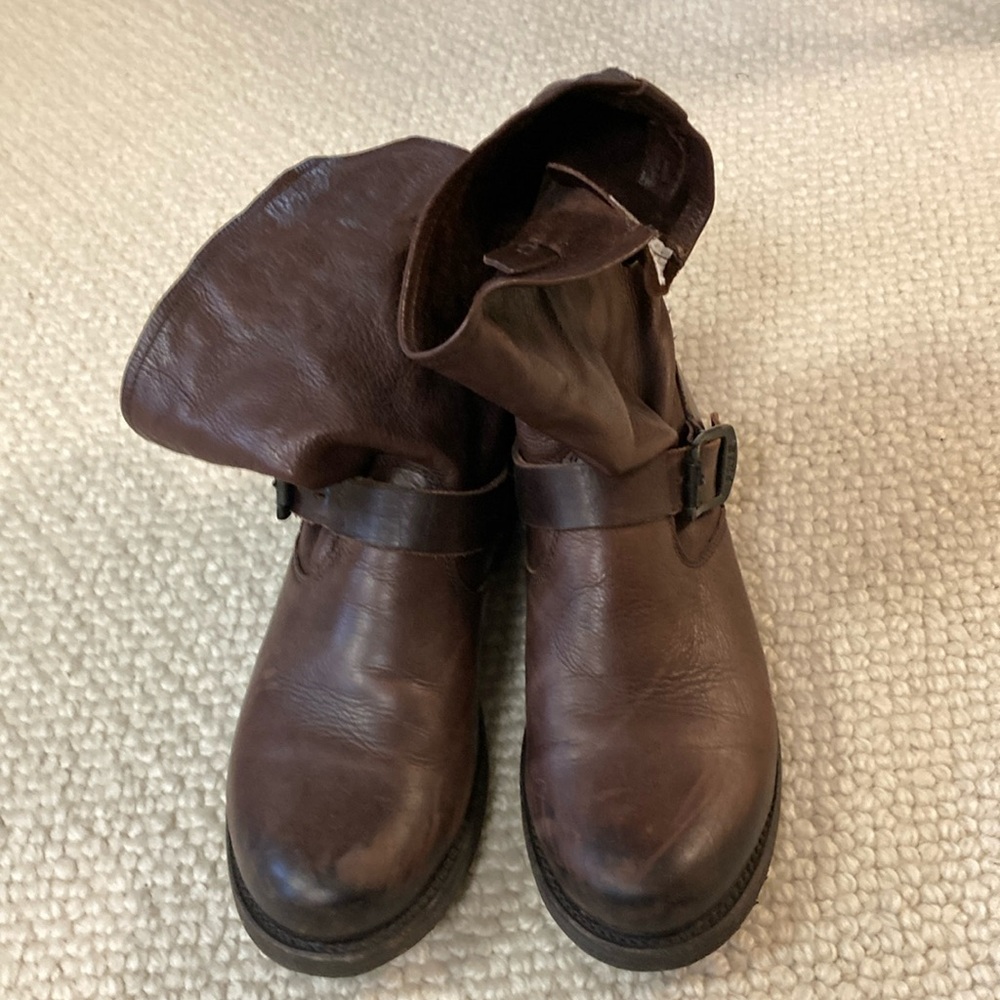 FRYE ankle boots with adjustable buckles for a custom fit.